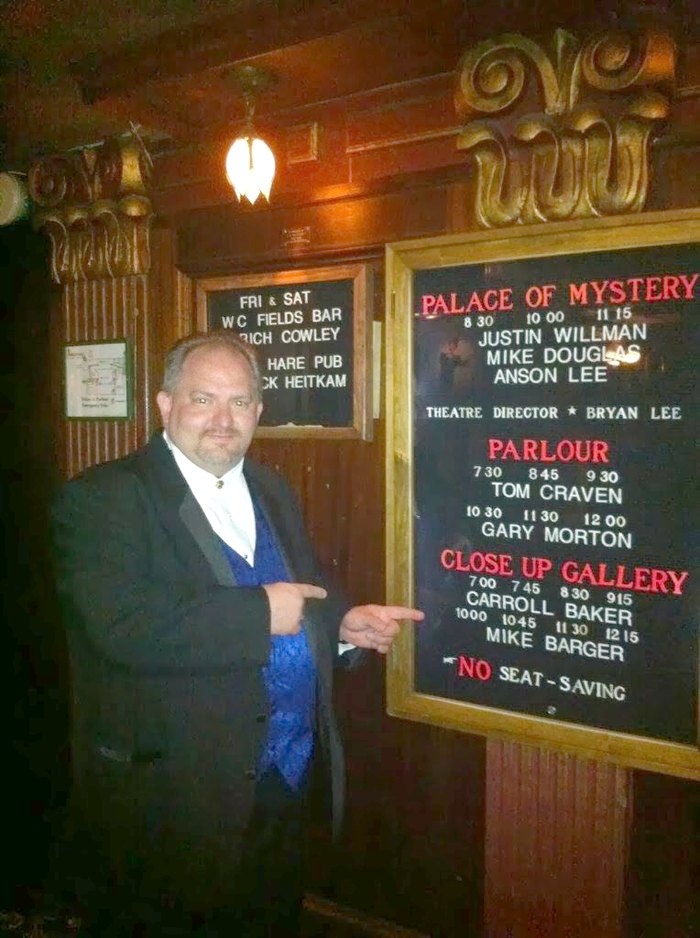 Carroll Baker beside the Magic Castle show board, listing him in the Close-Up Gallery